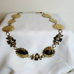 Unbranded gold tone Aztec style metal belt